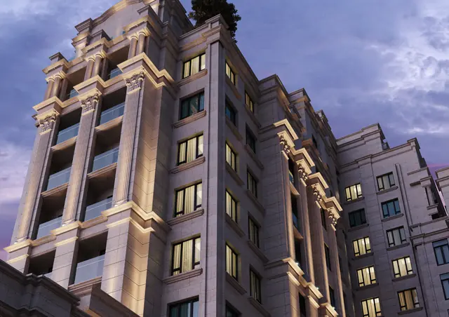 CGI of cornices and balconies on the upper floors against a twilight sky